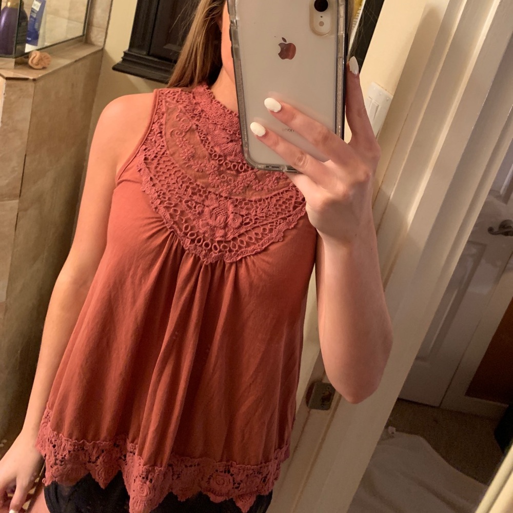 pink tank top with crochet detail